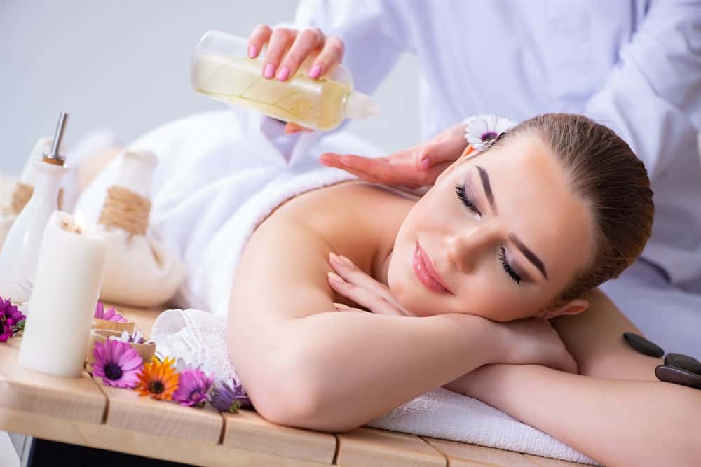 Woman receiving a thai aromatherapy massage